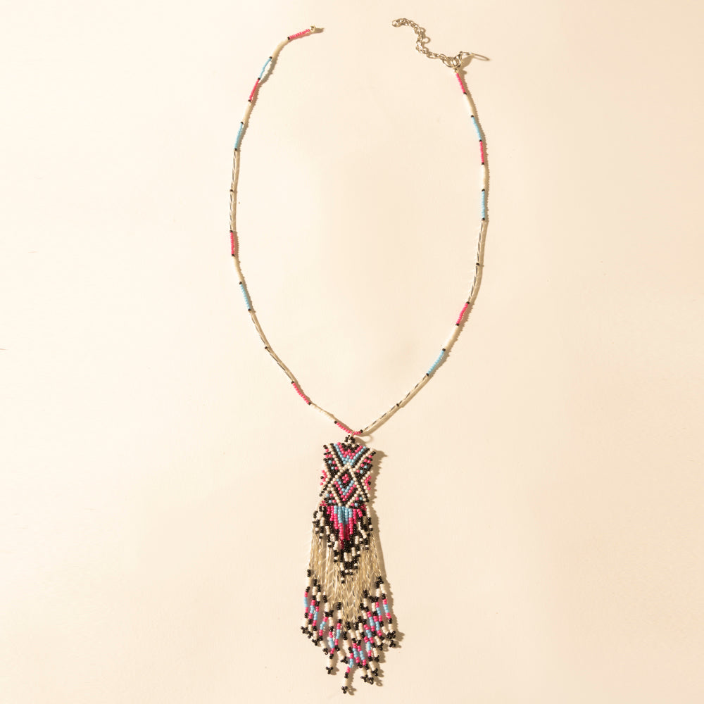 Myra Sky and Coral in necklace in Turquoise